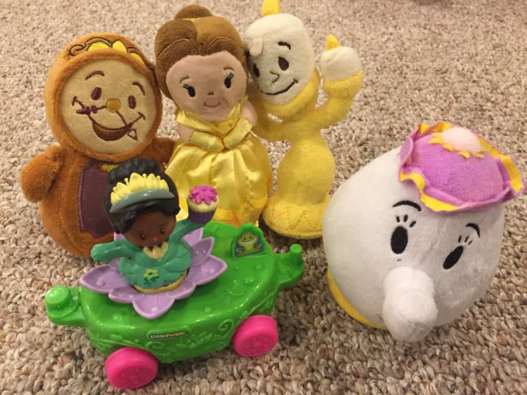 Disney Plush Toys and a Princess Tiana Figurine encourage imaginative play and storytelling.