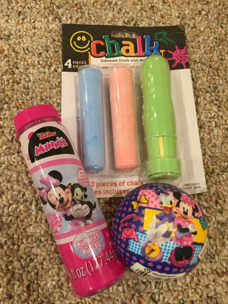 Sidewalk chalk, a soft ball, and bubbles are perfect for a toddler's Easter basket.