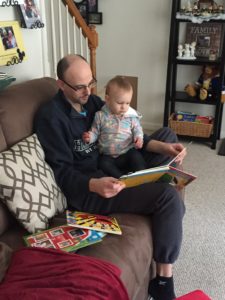 Reading with Daddy on Couch